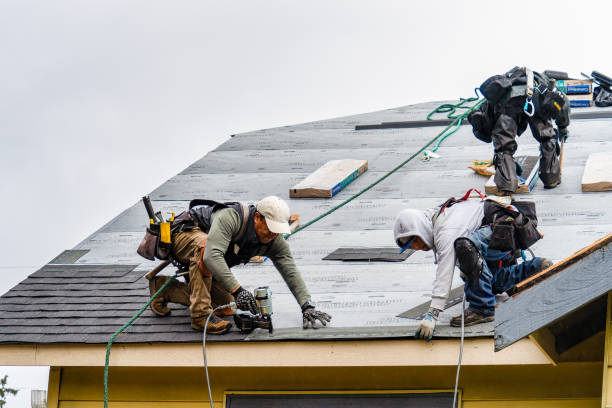 Professional Roofing technician working in Manville, RI